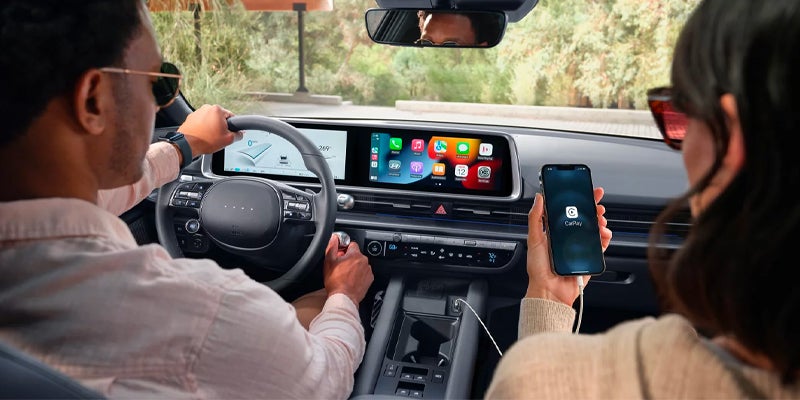 Electric car smart infotainment system and mobile connectivity